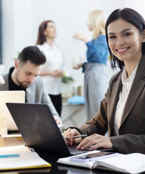 medium-shot-woman-working-laptop